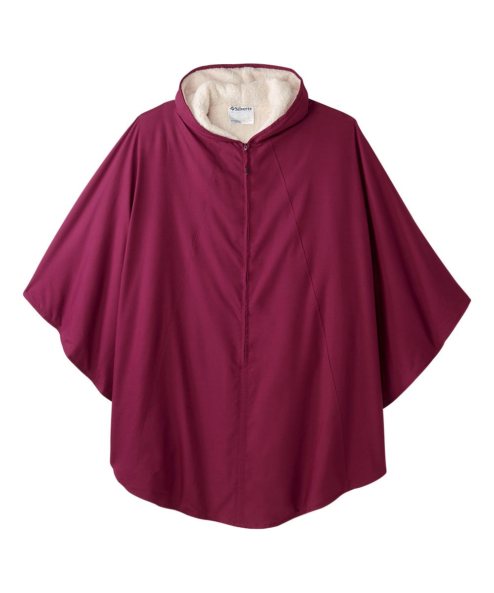 A red wheelchair cape with an attached hood, designed for warmth and ease of dressing with a front zipper.